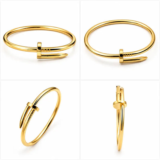 Gold bangle with a unique design on a white background