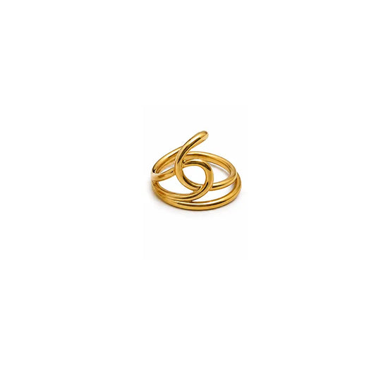 Gold ring with a unique design on a white background